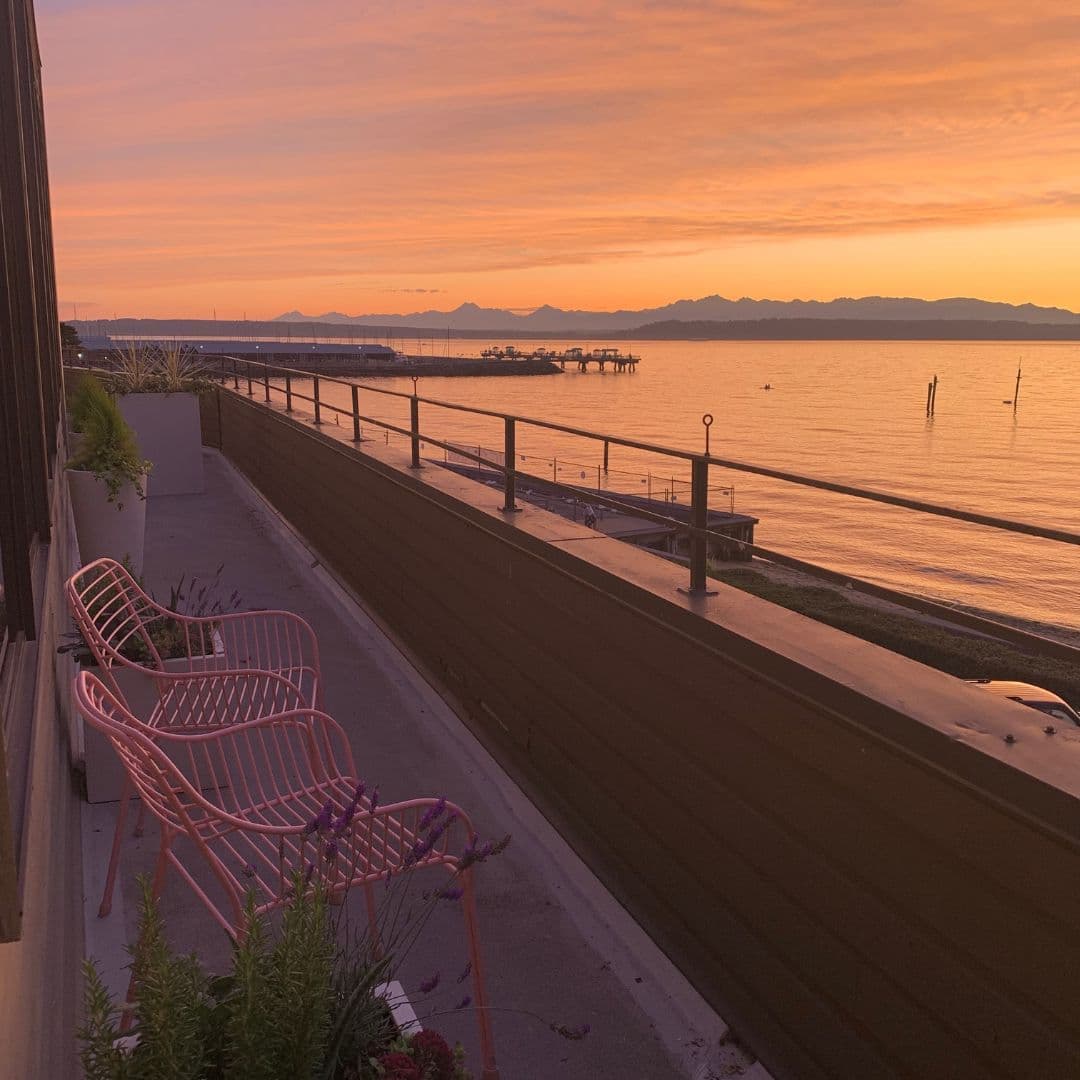 Stunning sunset over Edmonds waterfront with Olympic Mountains in the distance